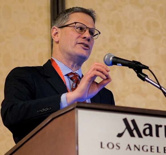 DWC Acting Administrative Director George Parisotto speaks during the 24th annual Educational Conference in Los Angeles on Thursday.